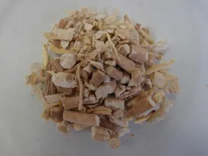 Cut dried pieces of Withania somnifera root known as Withaniae radix