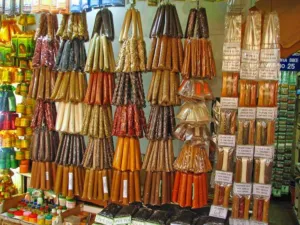 Spice stall in Kandy Market with bags of yellow Curcuma longa turmeric powder and other ground spices