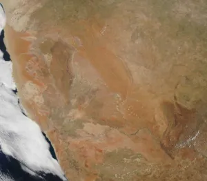 Satellite image of southern Africa showing the Namib coast and the red-brown Kalahari interior